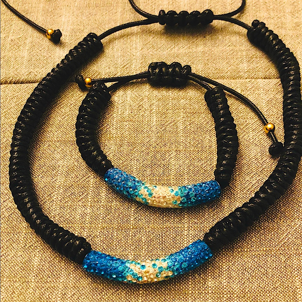 Matching teal and clear rhinestone encrusted tube bead necklace and bracelet